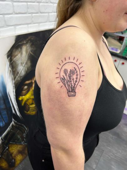 Floral light bulb ignorant style tattoo