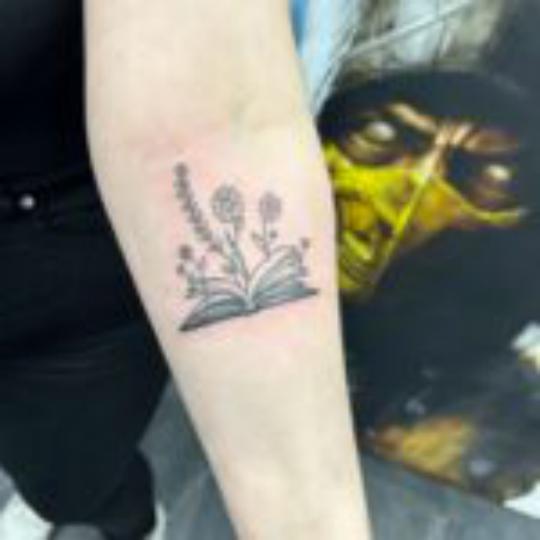 Floral book ignorant style tattoo