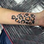 Leopard style tattoo