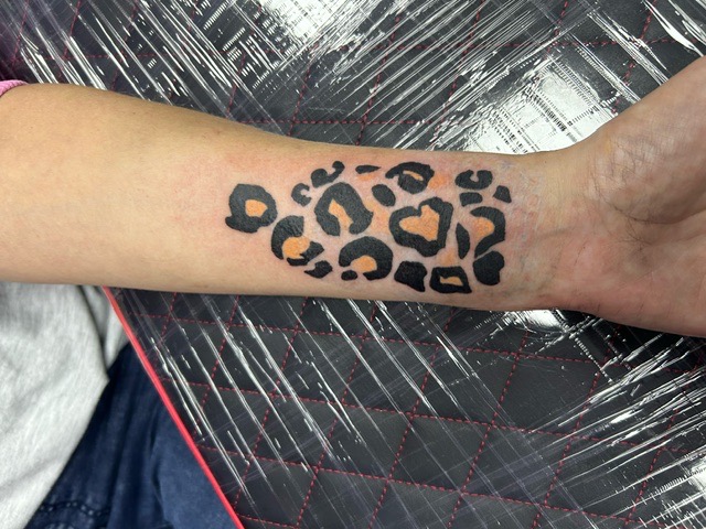 Leopard style tattoo