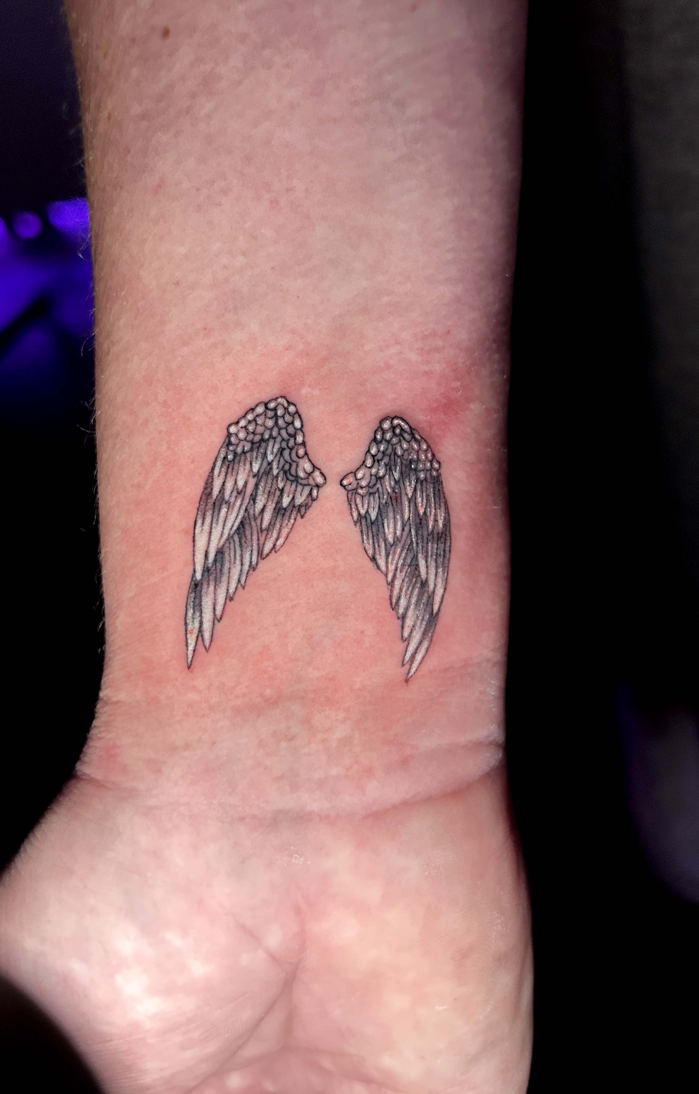 Angel wings tattoo