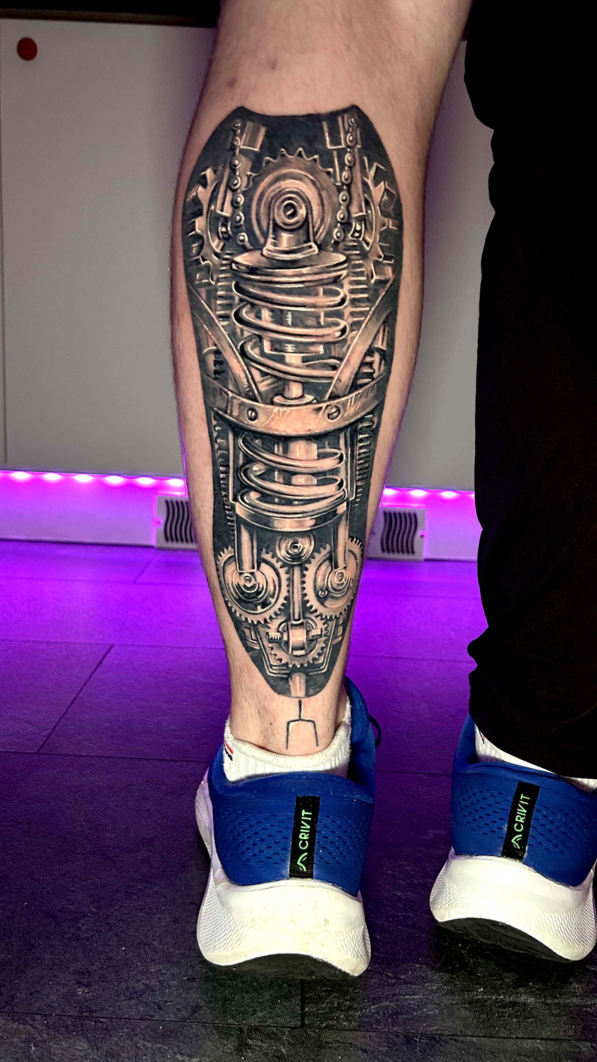 Bionic calve tattoo