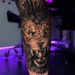 Lion calf tattoo