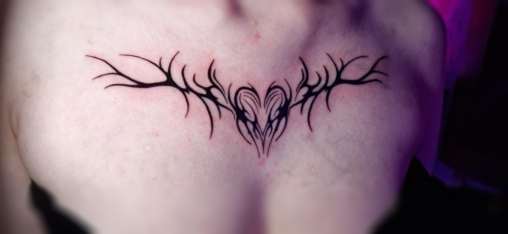 Chest piece tattoo